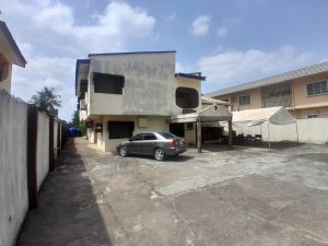 FOR SALE: Five (5) bedroom detached duplex comprising of: 3 living rooms, dining area, kitchen/store, ante room, guest toilet, gen house, Bq, paved compound, ample parking space, fenced and gated..  Land size of 1,327sqm @ Okota, Lagos.  Title: C of O