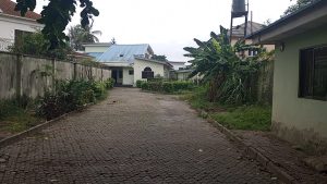 FOR SALE: A detached house consisting Five (5) Bedrooms with Two (2) rooms detached BQ, security post, swimming pool etc. within a uniformed security/gated estate.