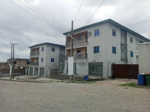 FOR SALE:  Block A (5 units of 3 bedroom flats with 1 warehouse). Block B (6 units of 3 bedroom flats). Block C & D (4 units of 2 bedroom flats) each.  Land size - 2,305sqm  Location - Omotoye Estate, Agege, Lagos